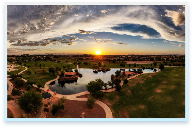 Aerial view of a golf course in Gilbert, AZ at sunset